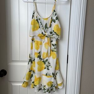 Lemon sundress with top tie and bottom ruffles